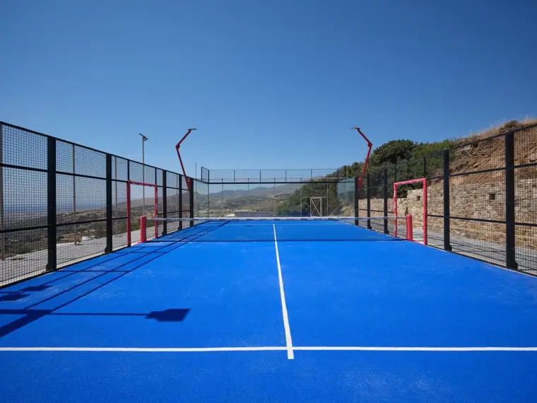 Private blue Wilson padel court with valley views