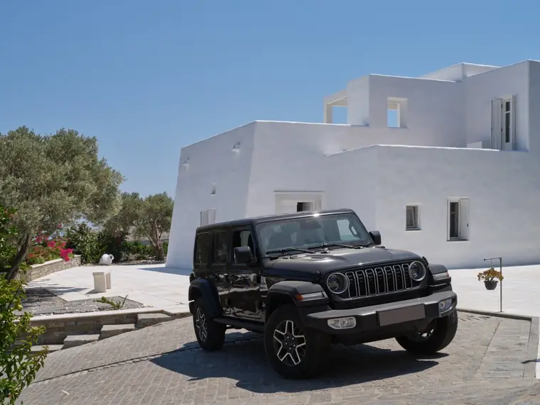 Main villa entrance and private parking area