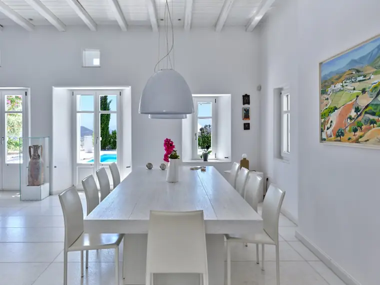 Bright dining room overlooking the pool