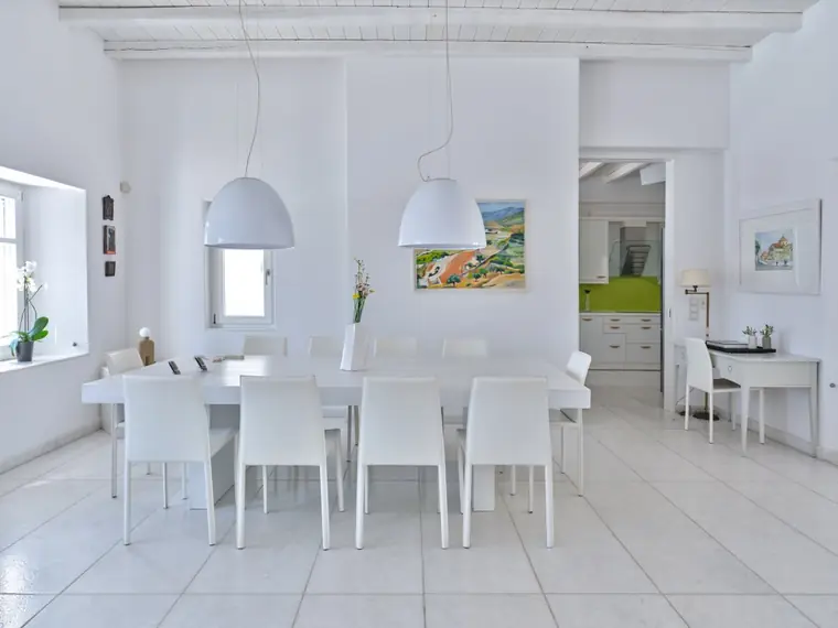 Dining room opening toward the Miele kitchen