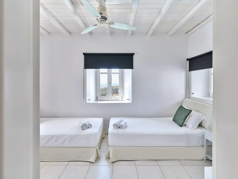 Twin bedroom viewed through its doorway