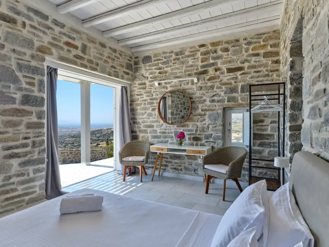 Stone guest suite with panoramic valley view